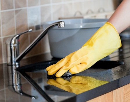 Professional carpet cleaning service in a Sutton home with a fresh living room carpet