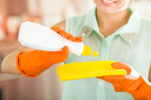 Trained cleaning staff using PPE during a deep clean in Sutton